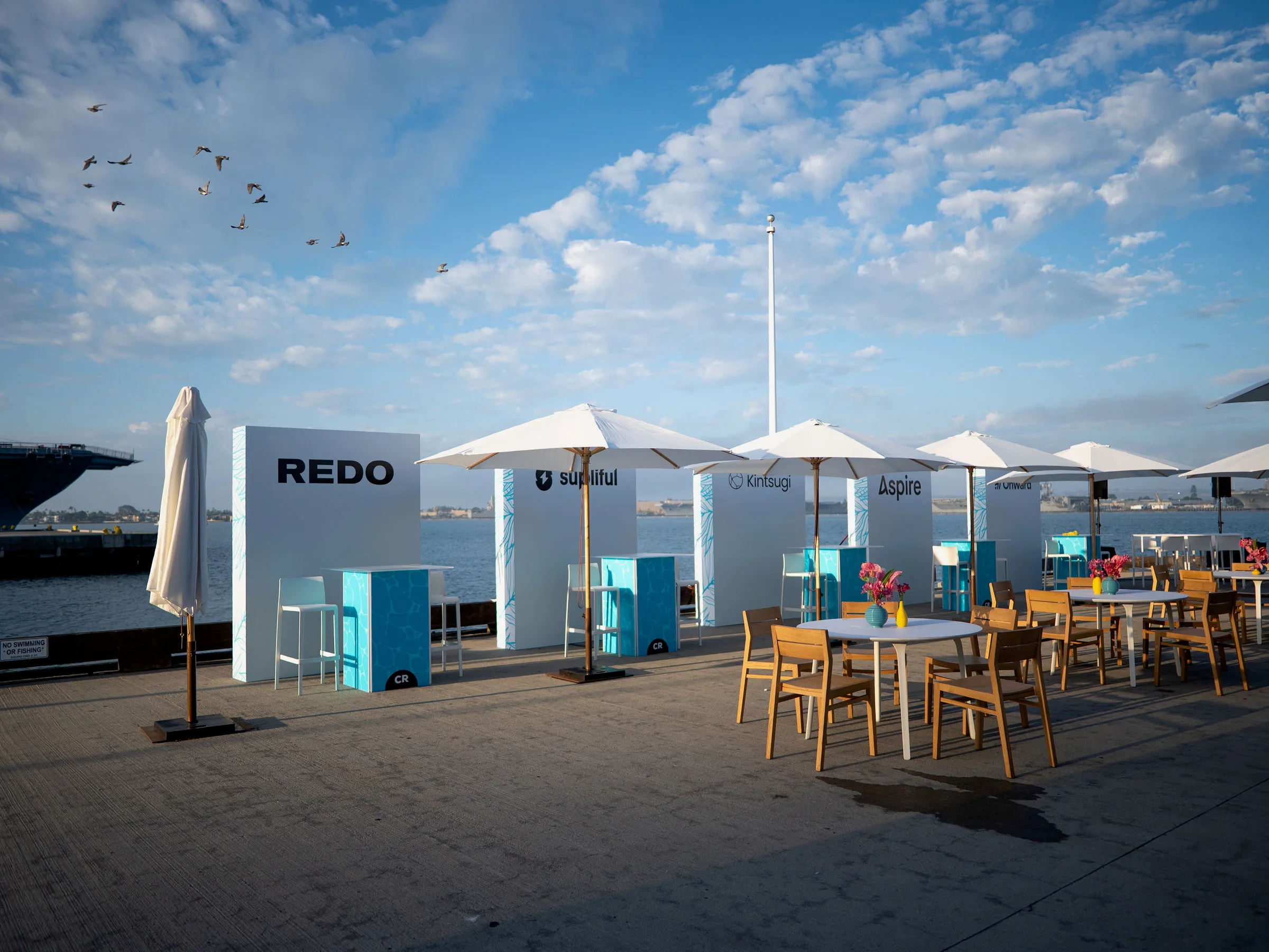 Golden-hour service, cream parasols.